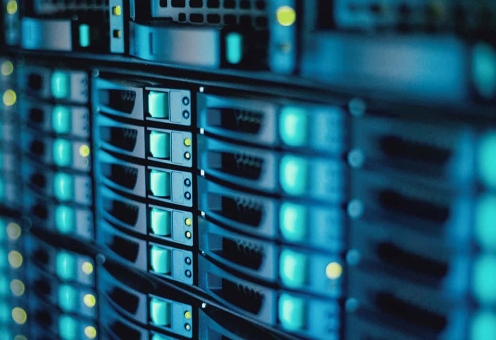 Close-up view of a series of data servers with illuminated indicators.